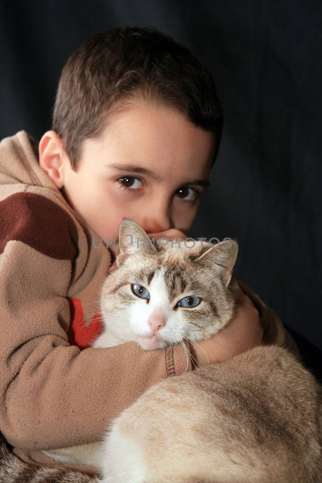 boy with beautiful firendly cat