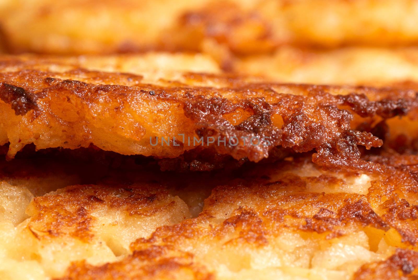 Closeup  of some freshly fried latkes, a potato pankake