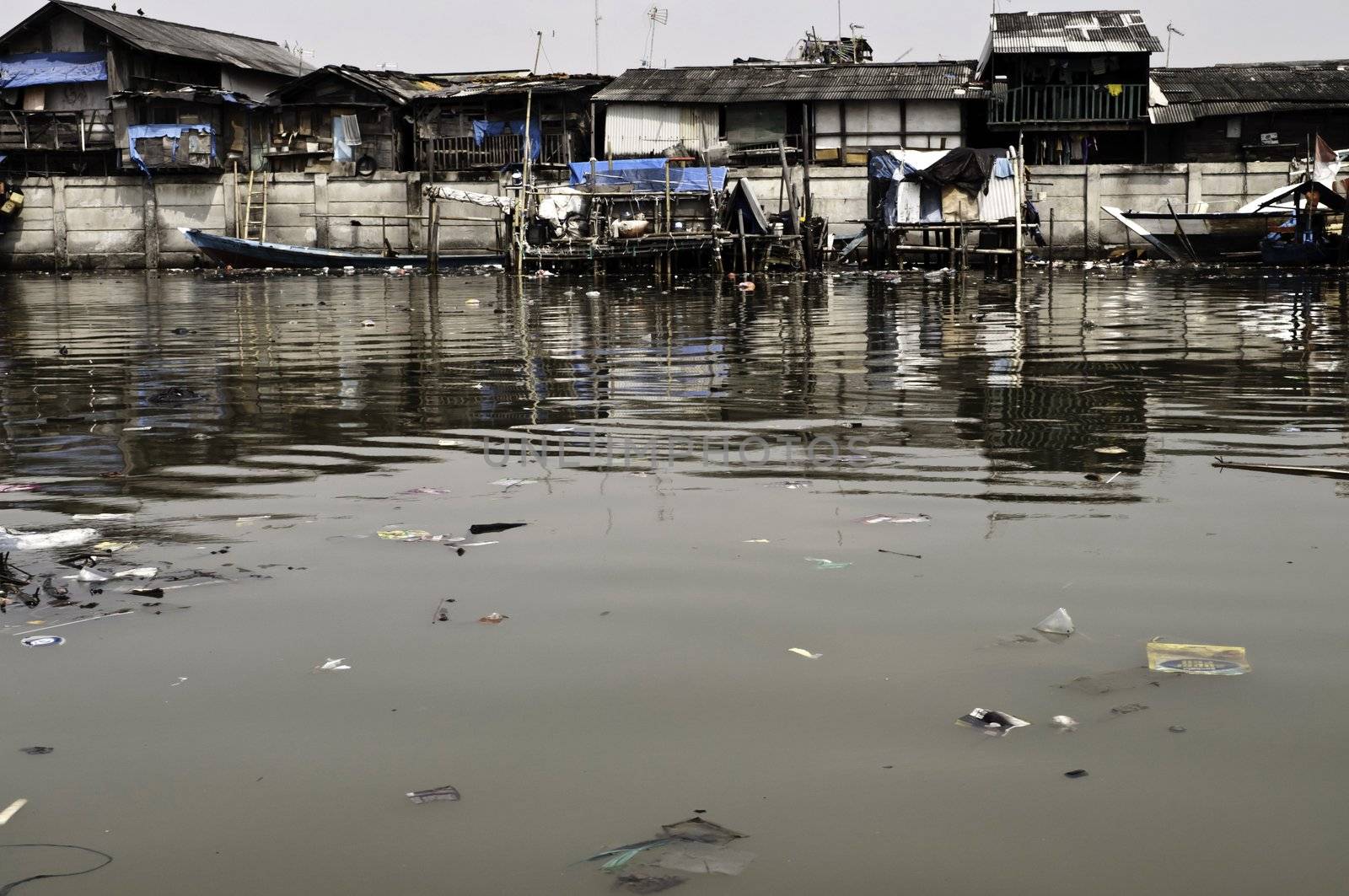 Slum poor housing in a Jakarta canal