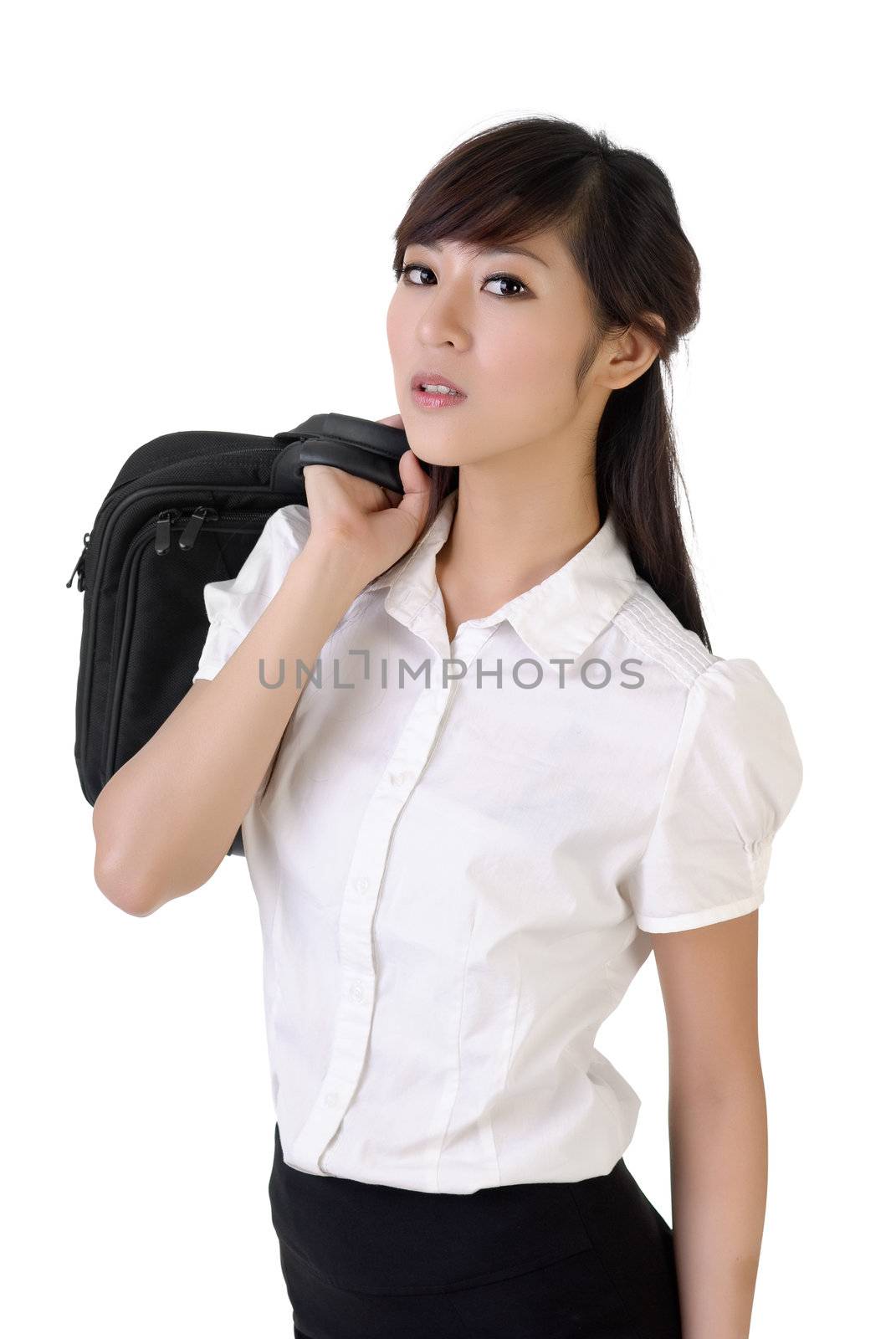 Attractive business woman with briefcase on shoulder against white background.