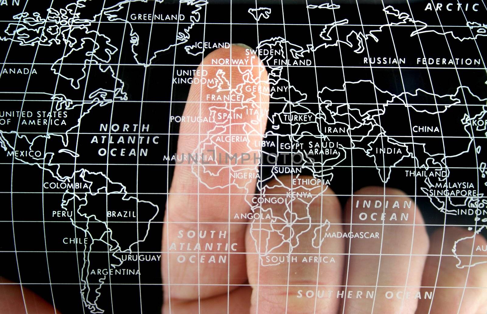 Map with Finger on the Uk
