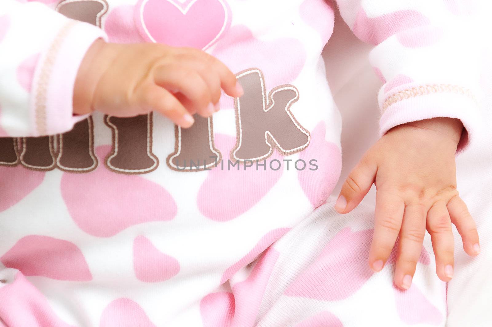 baby girl showing her small hands by Ansunette