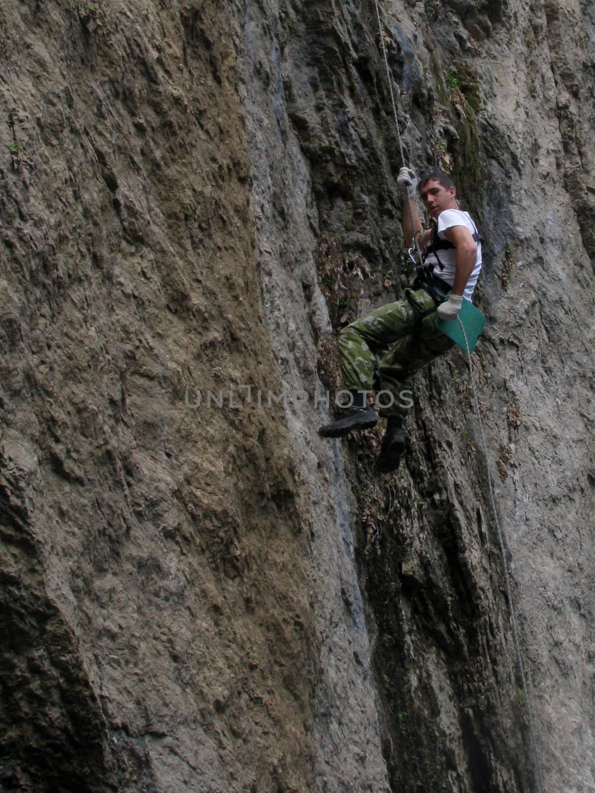 Rock-climbing; people; sports; mountaineering; an extreme; rest; tourism; entertainment