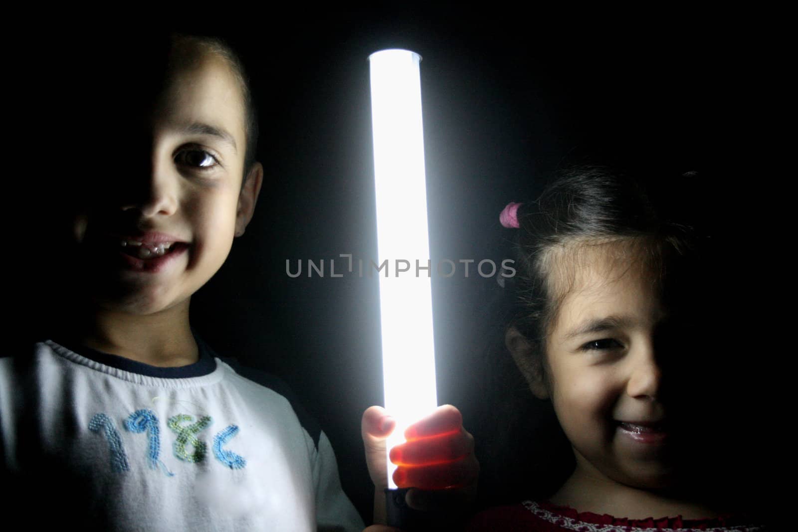 children portrait with light by jpcasais