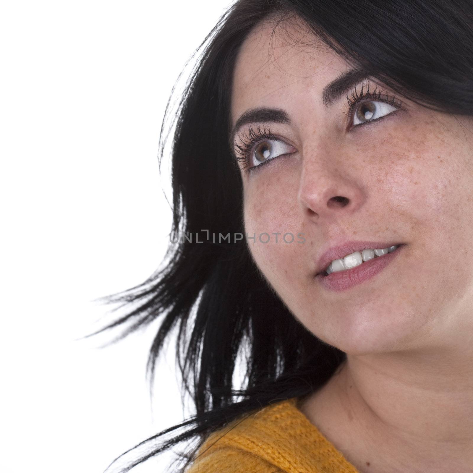 Young beautiful woman looking up isolated on white background