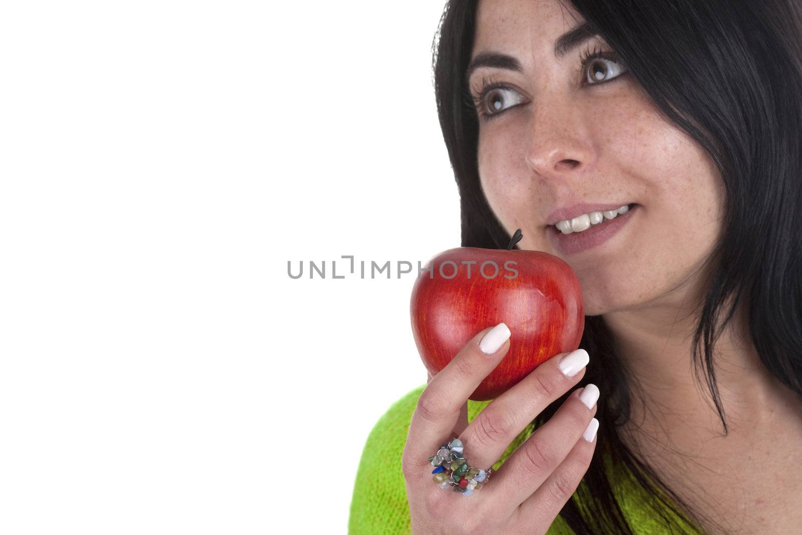 young woman holding healthy red apple in the hands isolated on white background