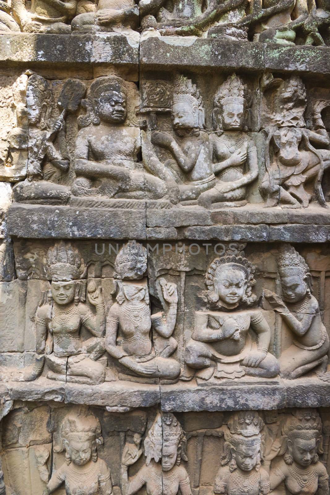 Image of ancient bas-relief at UNESCO's World Heritage Site of the Terrace of the Leper King, which is part of the larger temple complex of Angkor Thom, located at Siem Reap, Cambodia. 