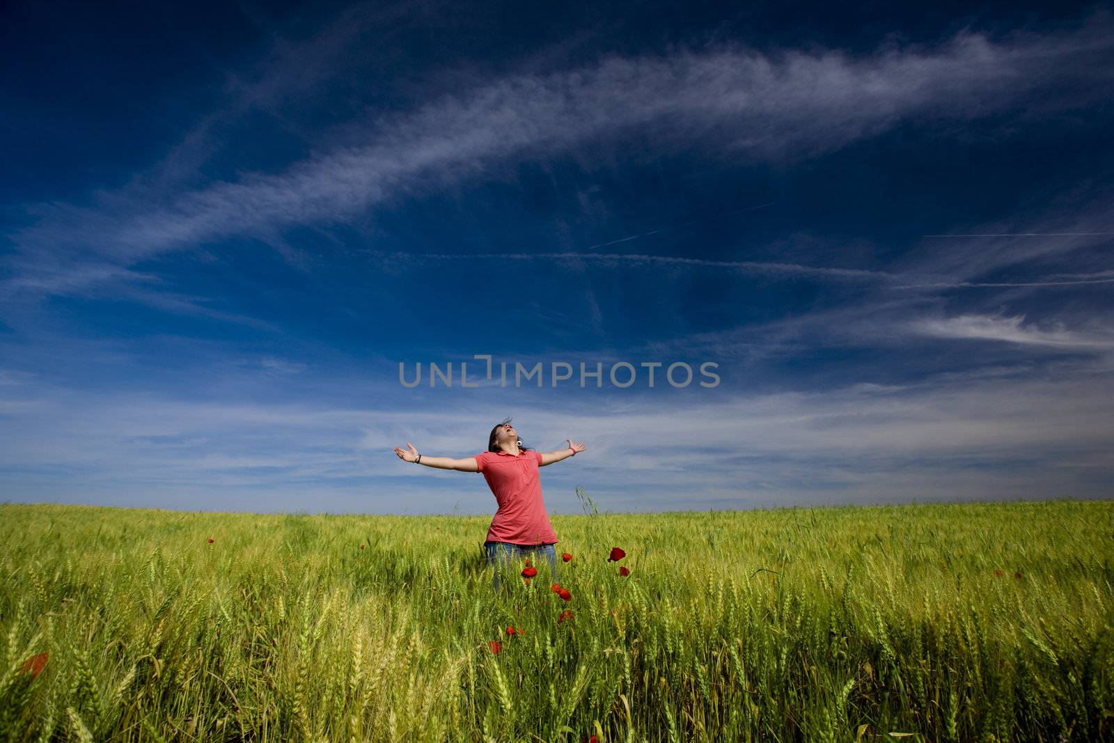 beautiful young woman happy in the nature by mlopes