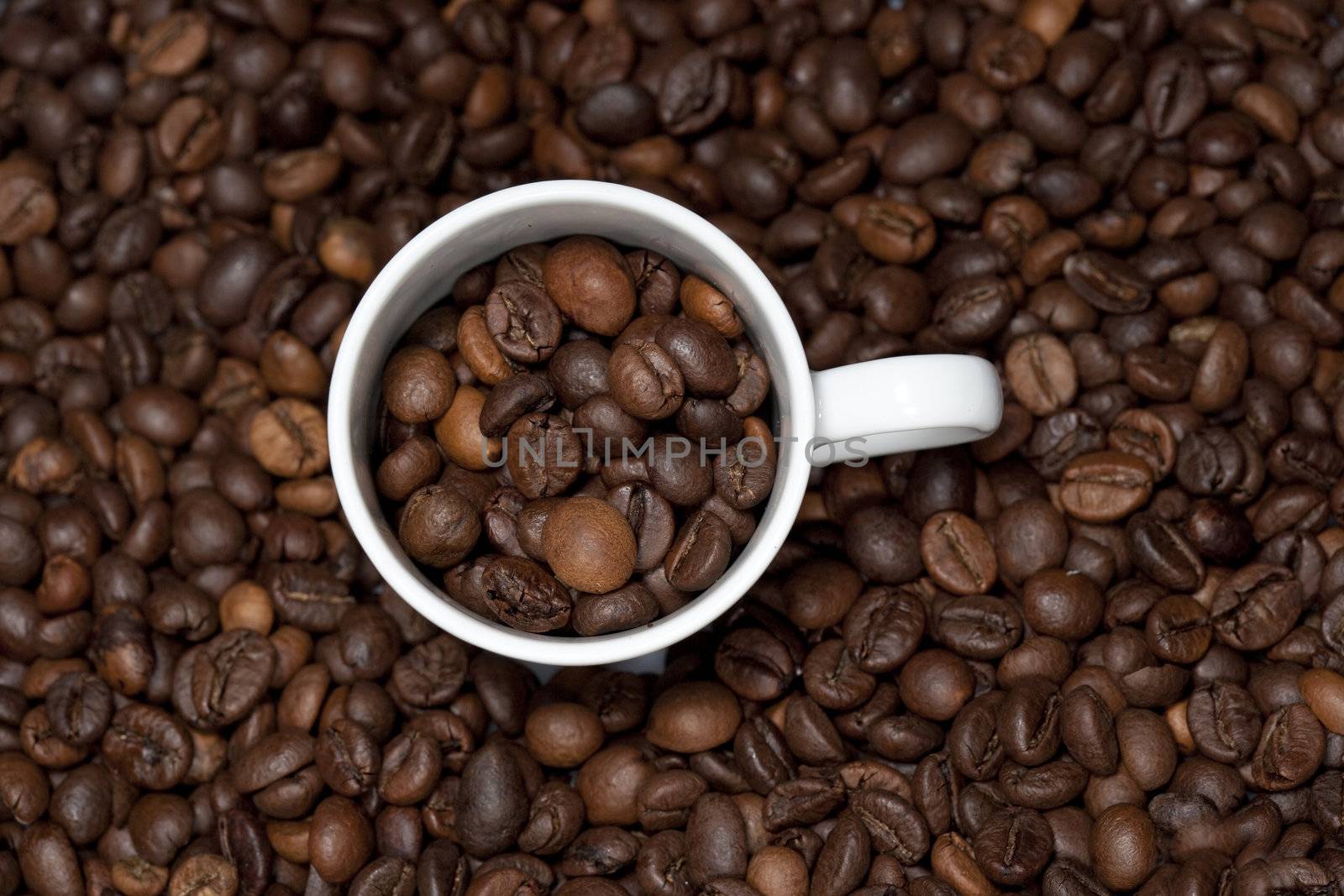 background with white cup and coffee beans - landscape orientation