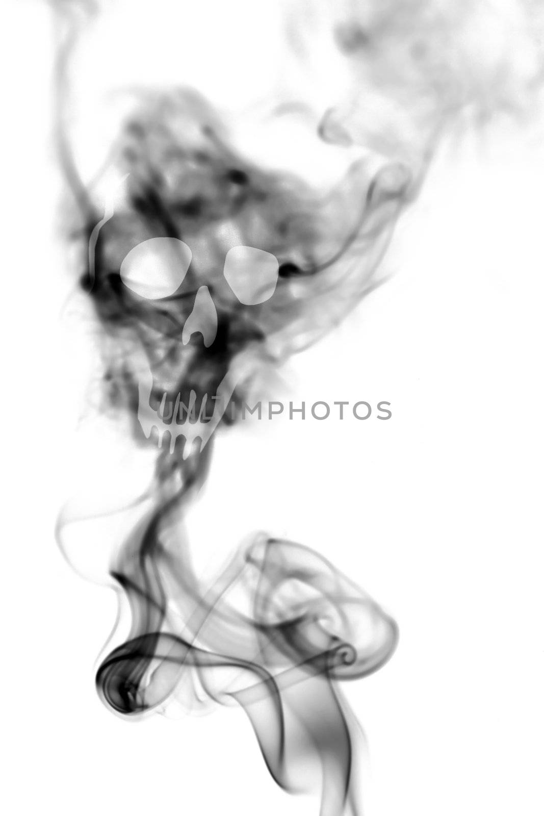 Death skull made with cigarette smoke isolated on white background