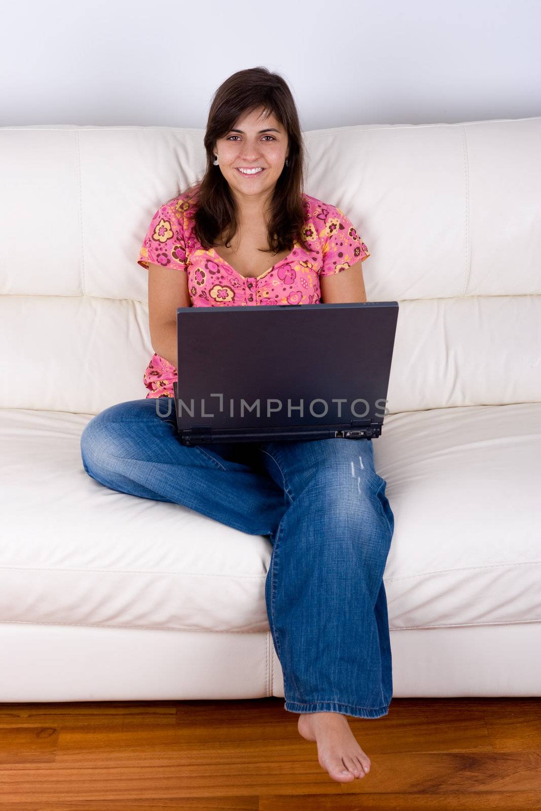 beautiful young woman with laptop computer by mlopes