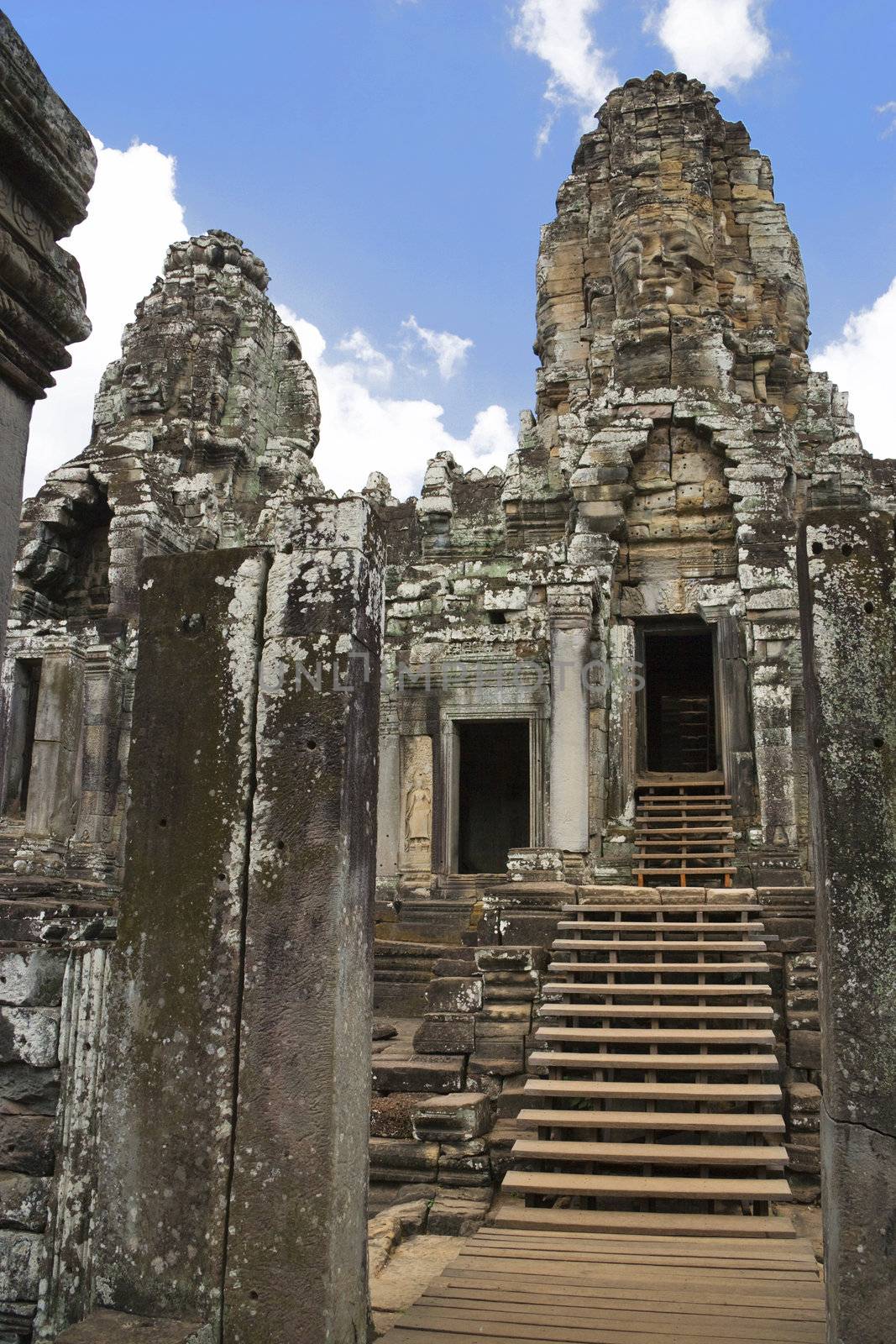 Image of UNESCO's World Heritage Site of Bayon, which is part of the larger temple complex of Angkor Thom, located at Siem Reap, Cambodia. This is one of the temples in Siem Reap where the Hollywood movie Lara Croft Tomb Raider was filmed at.