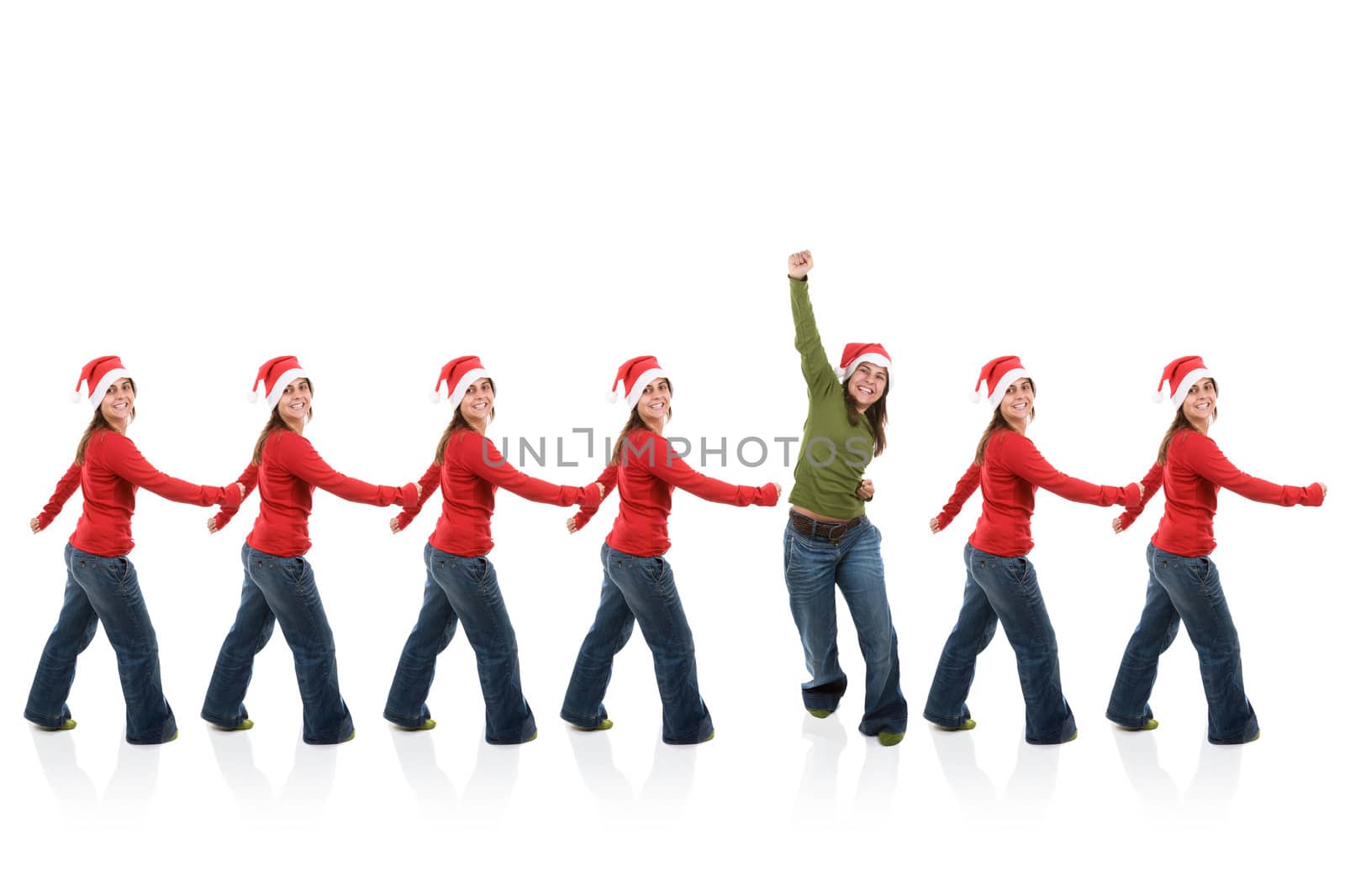 group of santa claus women in line with one breaking the pattern and jumping in happiness. isolated on white background.