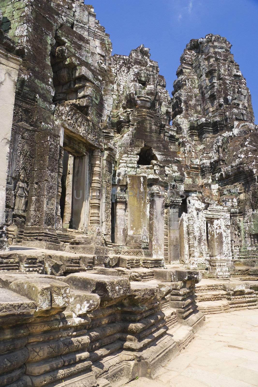 Image of UNESCO's World Heritage Site of Bayon, which is part of the larger temple complex of Angkor Thom, located at Siem Reap, Cambodia. This is one of the temples in Siem Reap where the Hollywood movie Lara Croft Tomb Raider was filmed at.