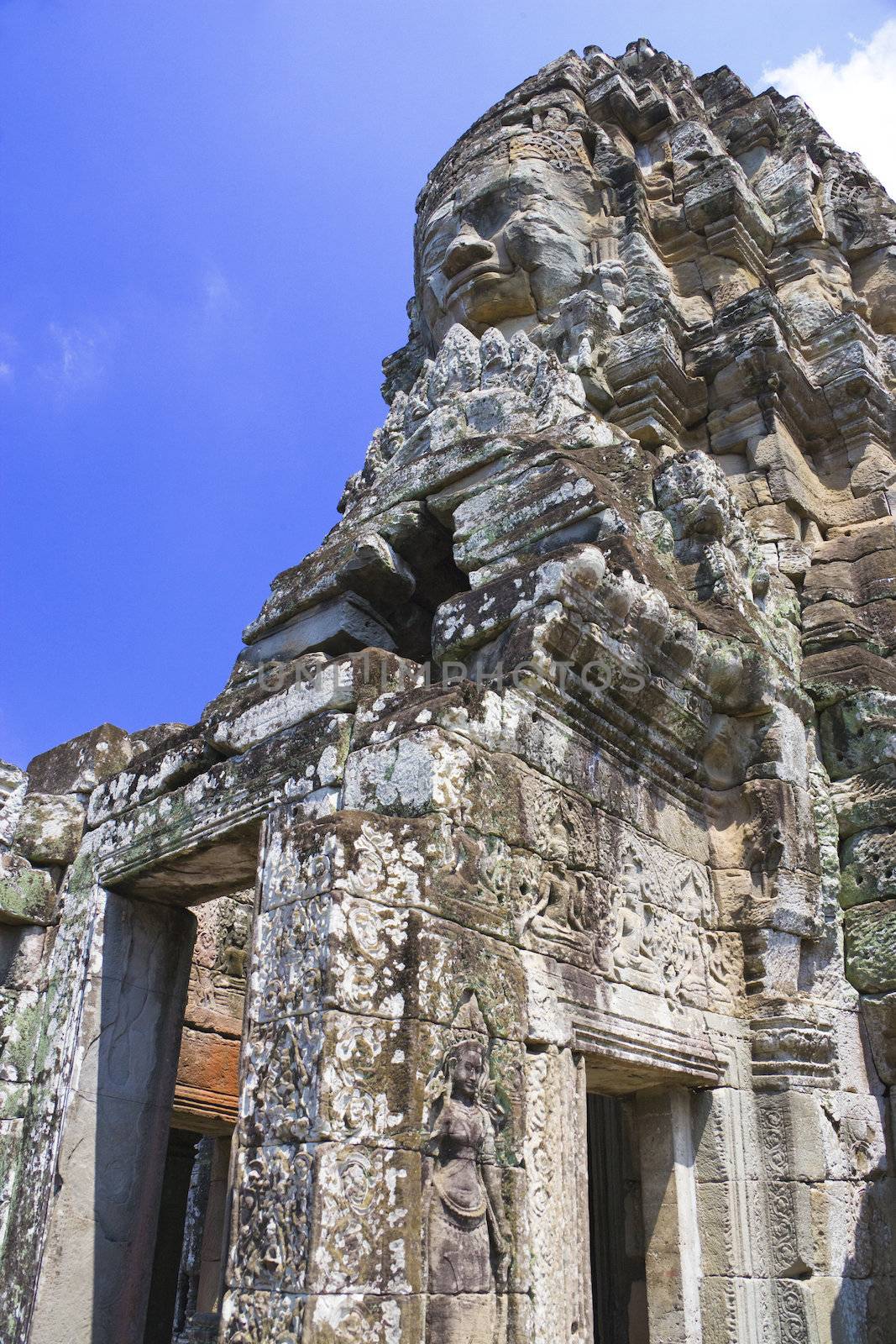 Image of UNESCO's World Heritage Site of Bayon, which is part of the larger temple complex of Angkor Thom, located at Siem Reap, Cambodia. This is one of the temples in Siem Reap where the Hollywood movie Lara Croft Tomb Raider was filmed at.