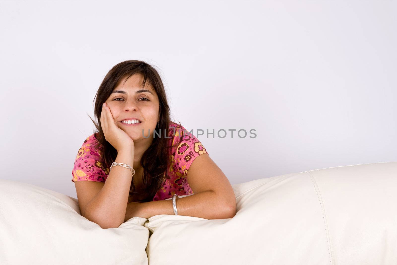 beautiful young woman in pink smiling by mlopes