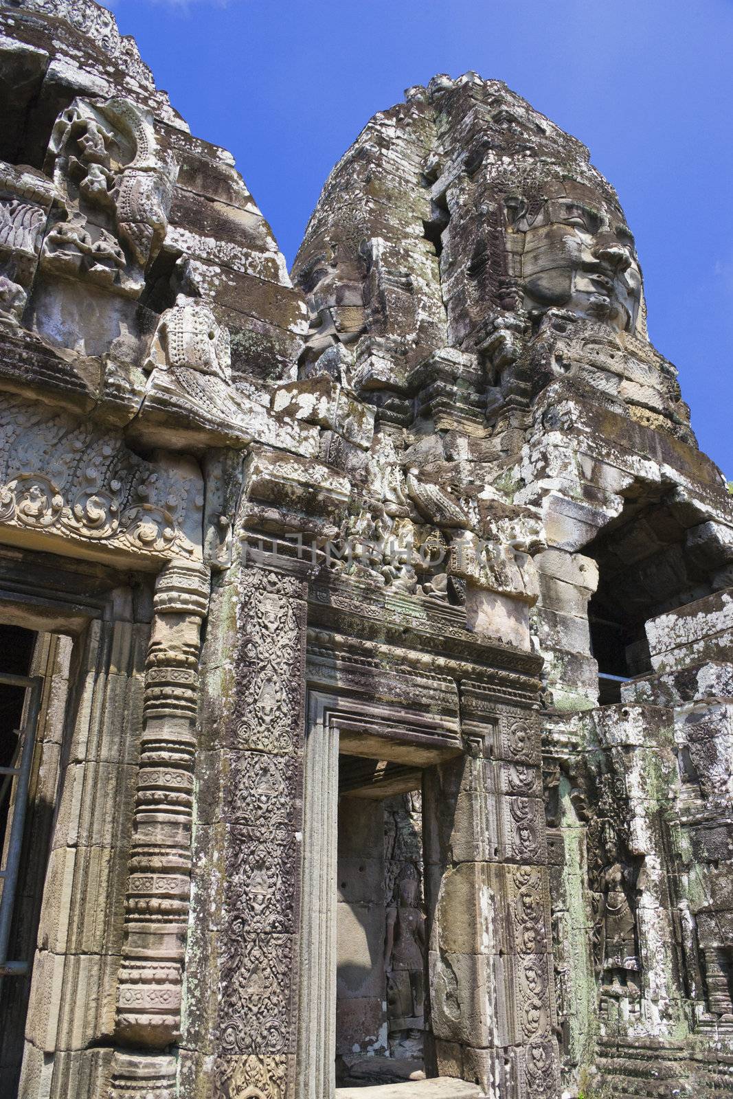 Image of UNESCO's World Heritage Site of Bayon, which is part of the larger temple complex of Angkor Thom, located at Siem Reap, Cambodia. This is one of the temples in Siem Reap where the Hollywood movie Lara Croft Tomb Raider was filmed at.