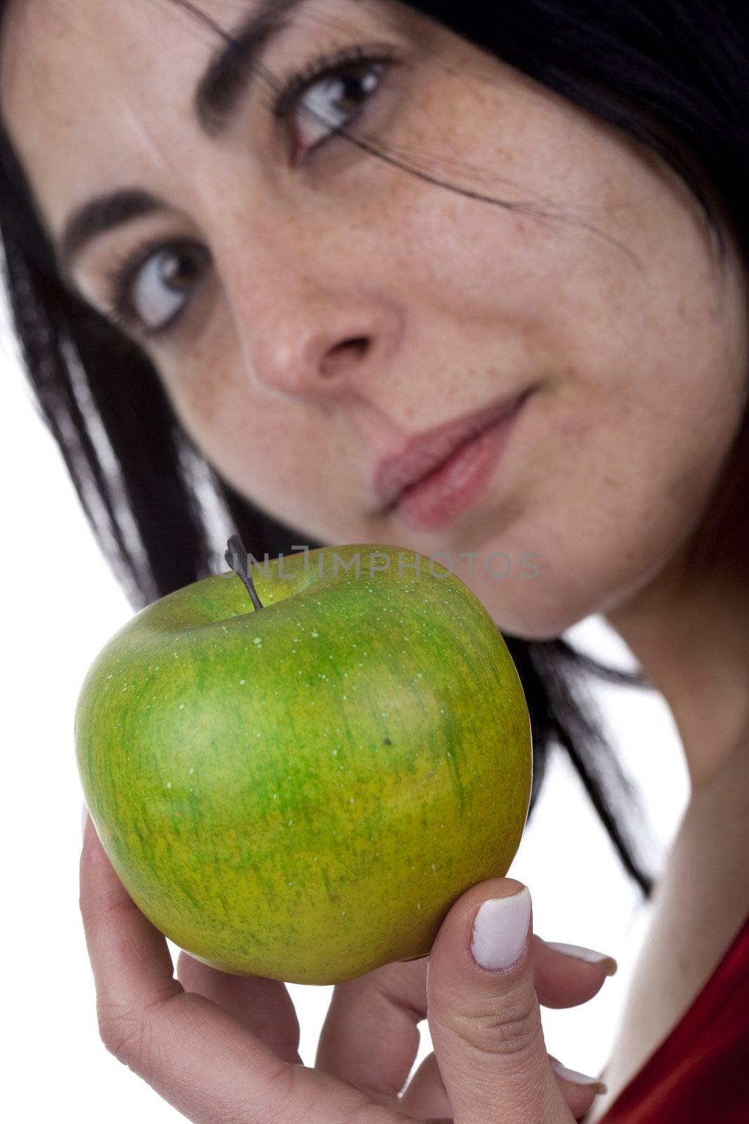 young woman holding green apple in the hand - isolated on white background