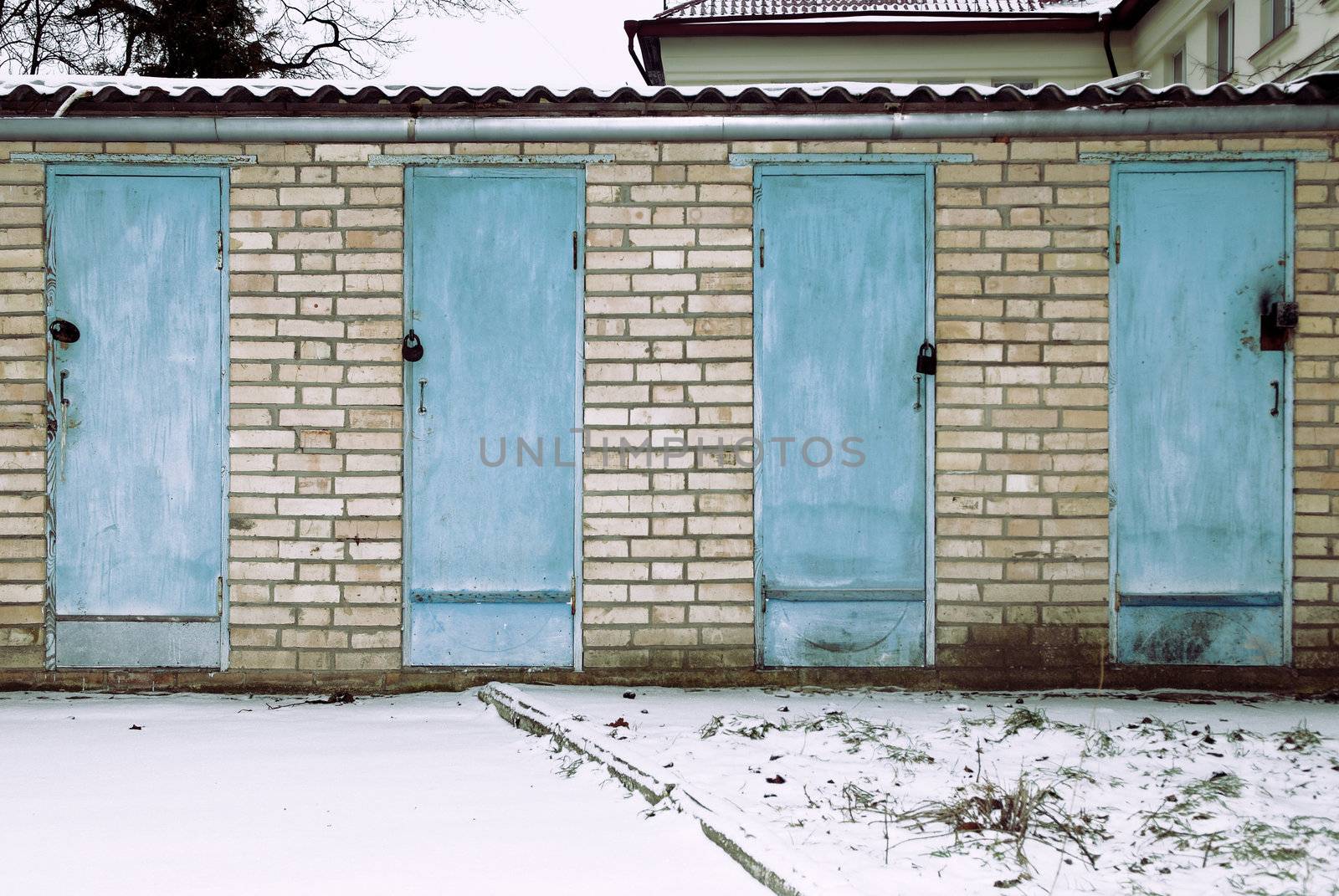 Four sheds - four locked doors - the cabins of the back yard