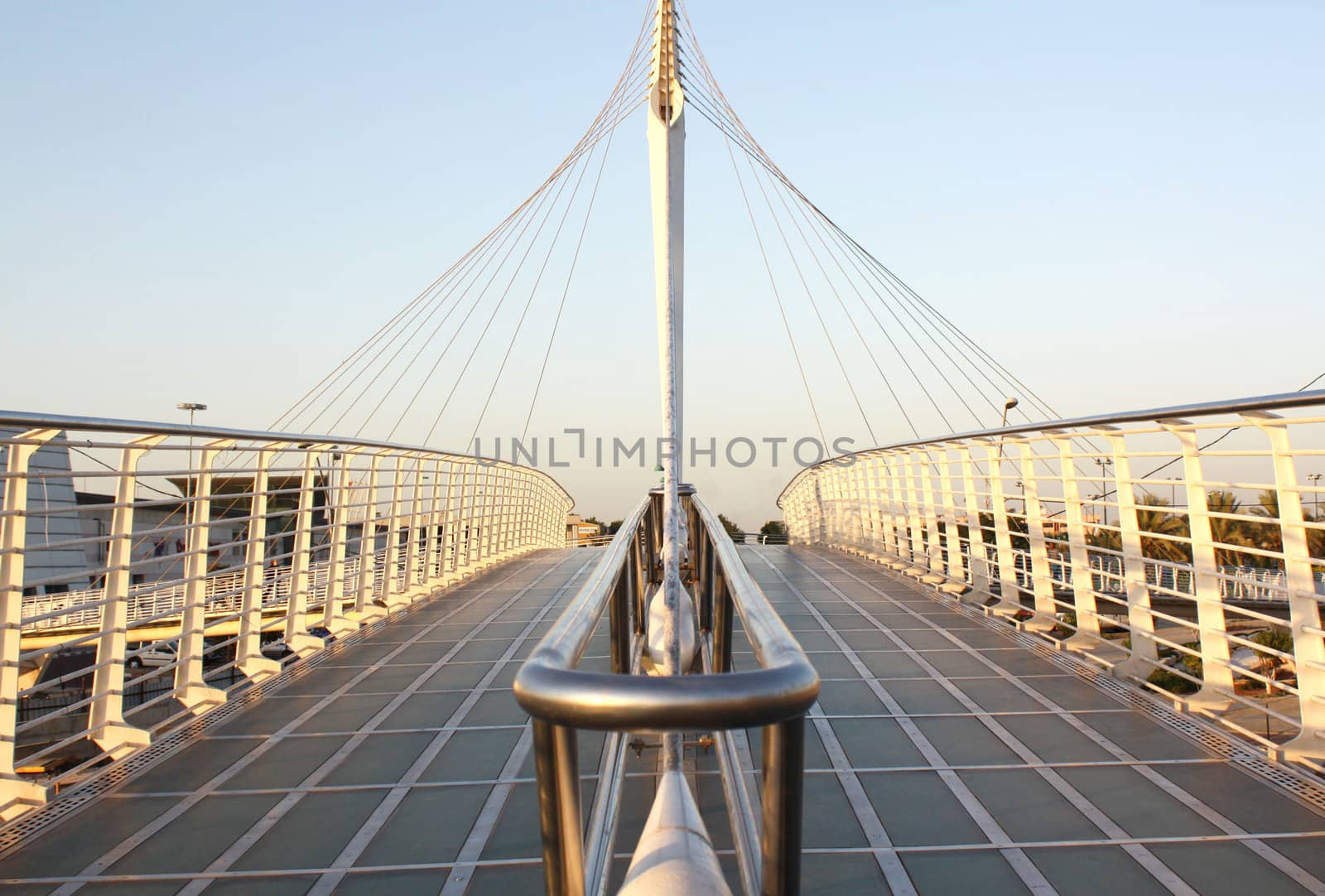 hanged bridge under sunset sky