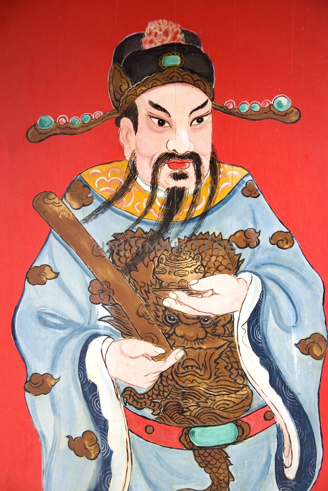 Image of a guardian painted on a chinese temple door in Malaysia.