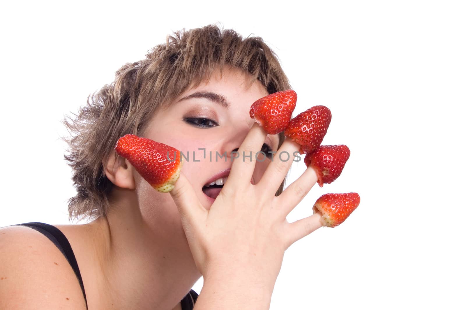Sexy girl with red strawberry isolated on white background
