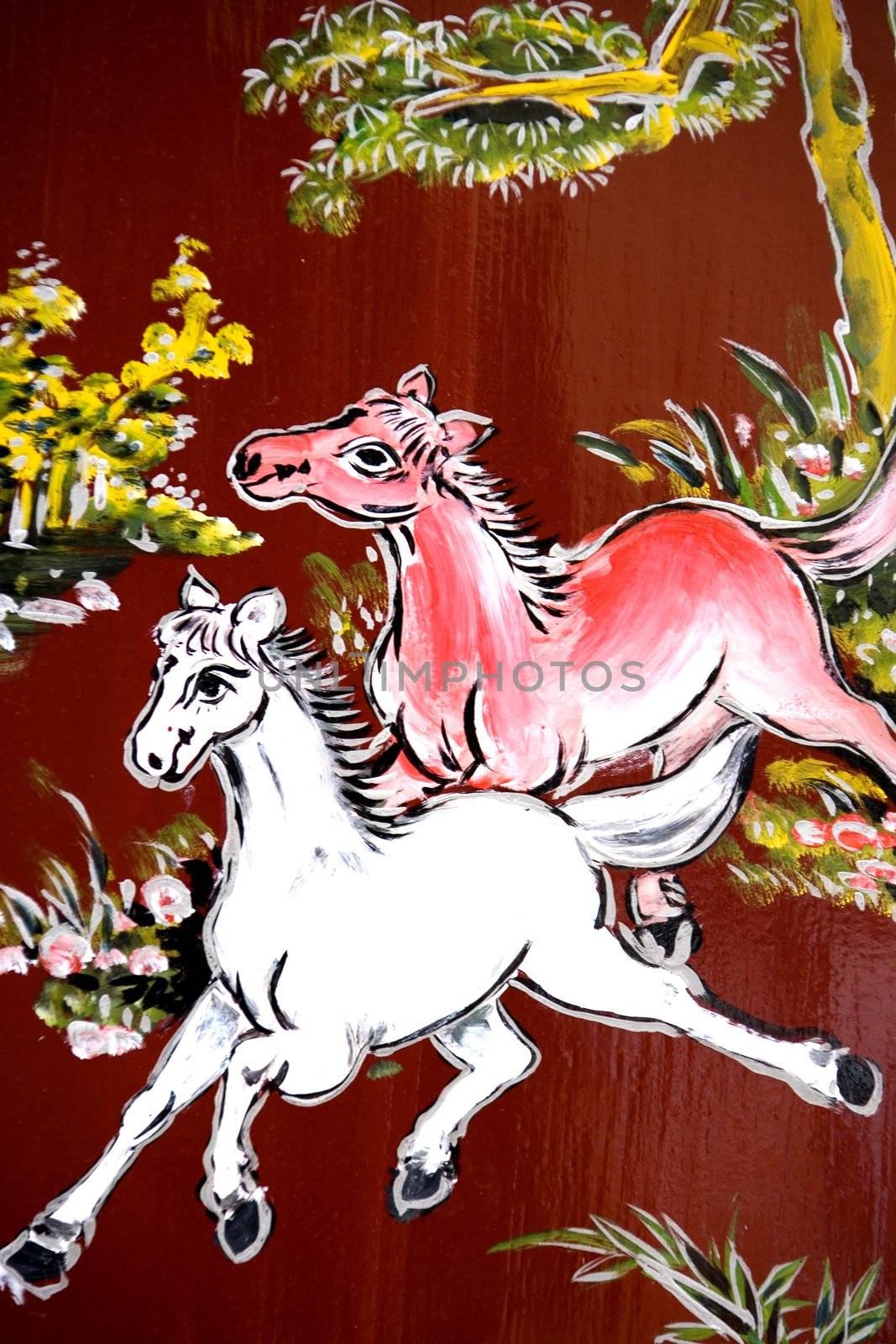 Traditional artwork on a Chinese temple wall in Malaysia.