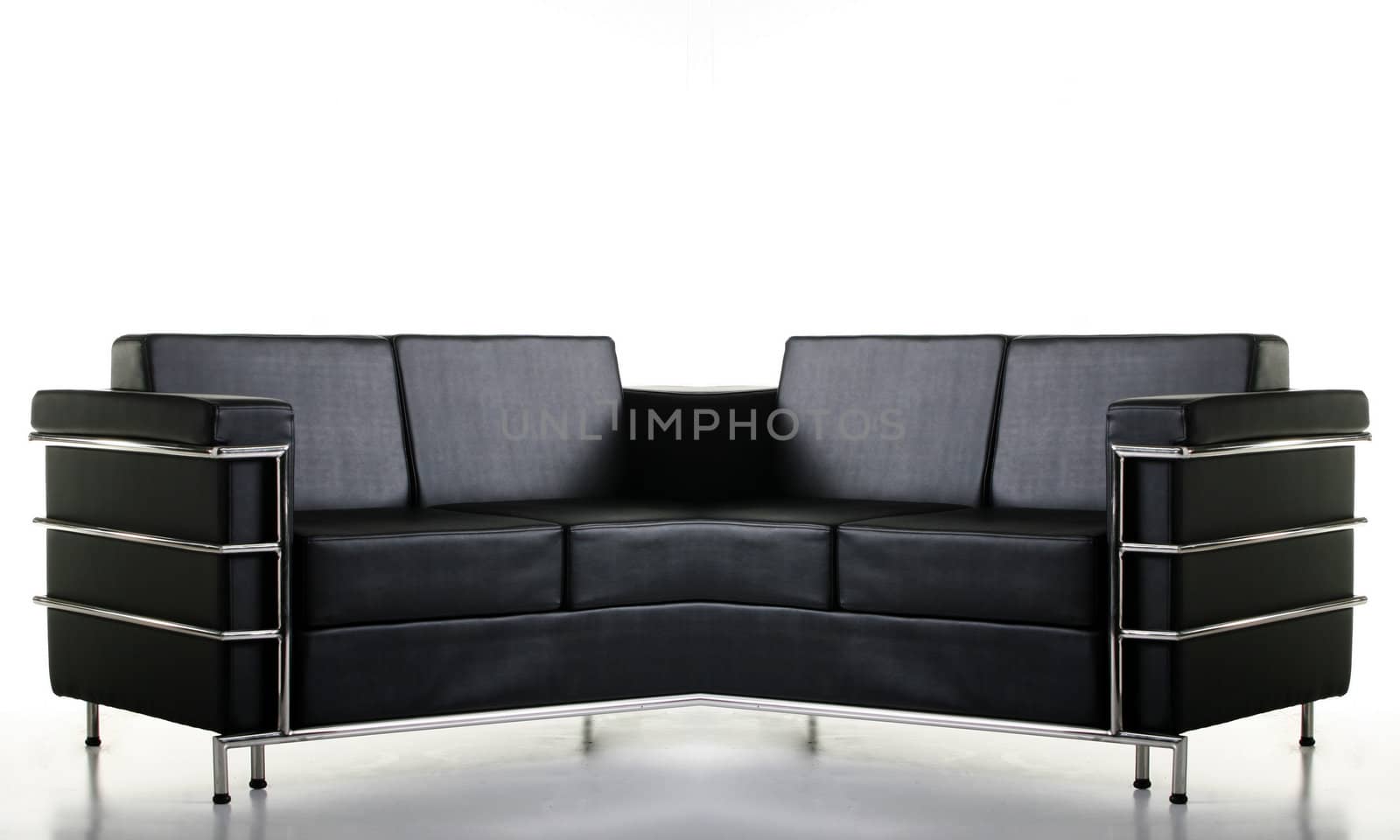 A black leather sofa isolated  on the white background