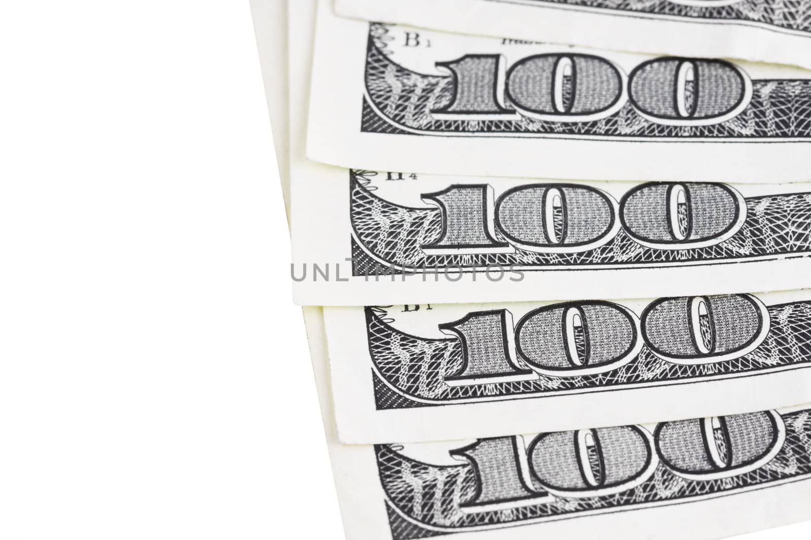 One Hundred Dollar Bills isolated over white. Close-up shot