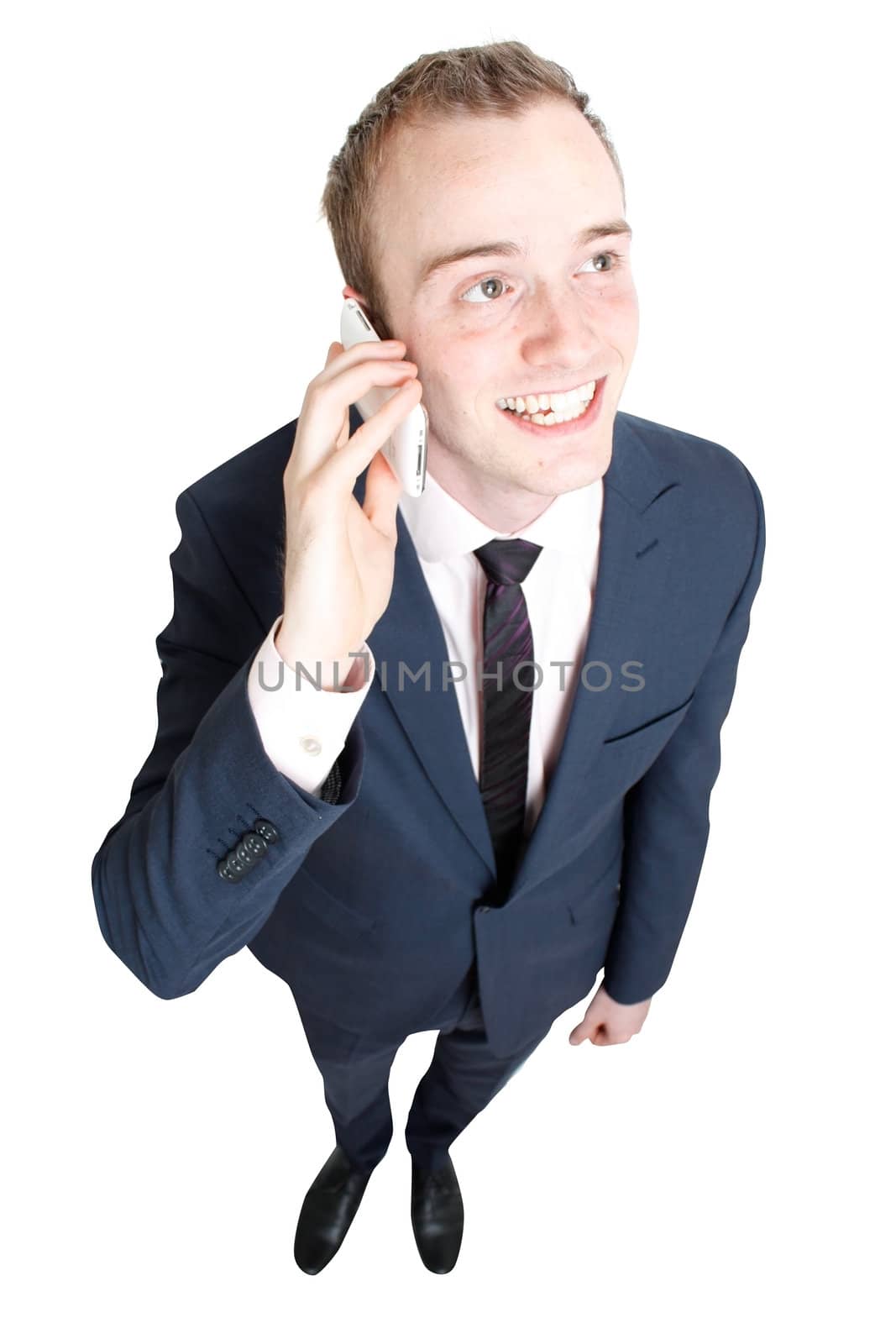 Business man talking in cell phone by leeser