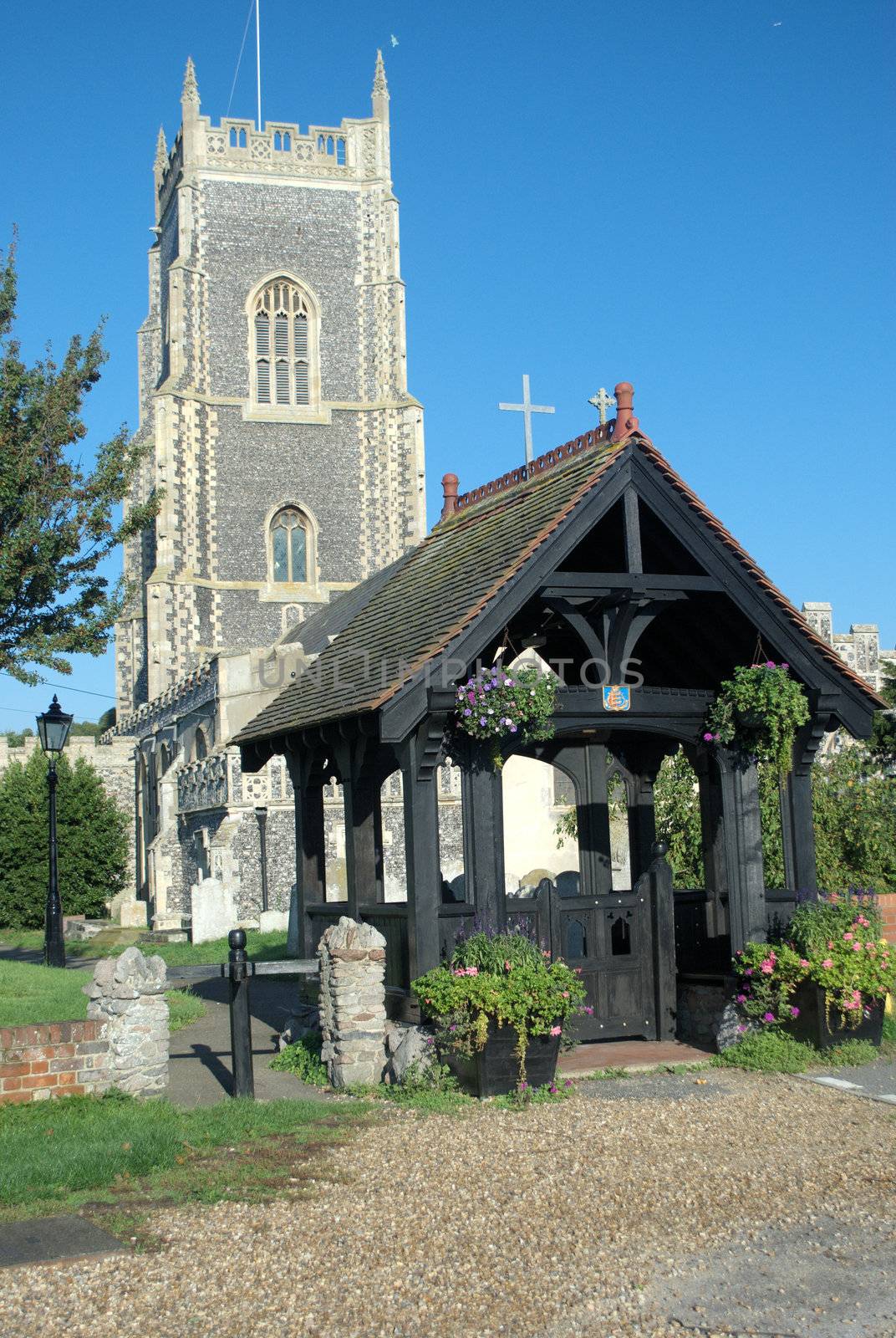 Typical English parish church with lych gate in foreground