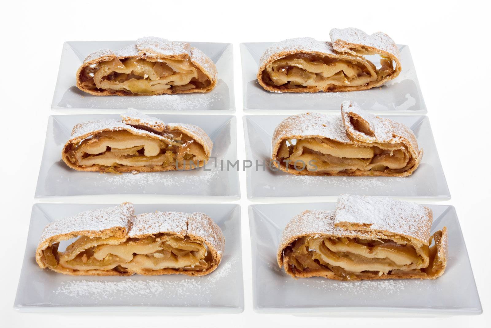 detail of an apple strudel with icing sugar