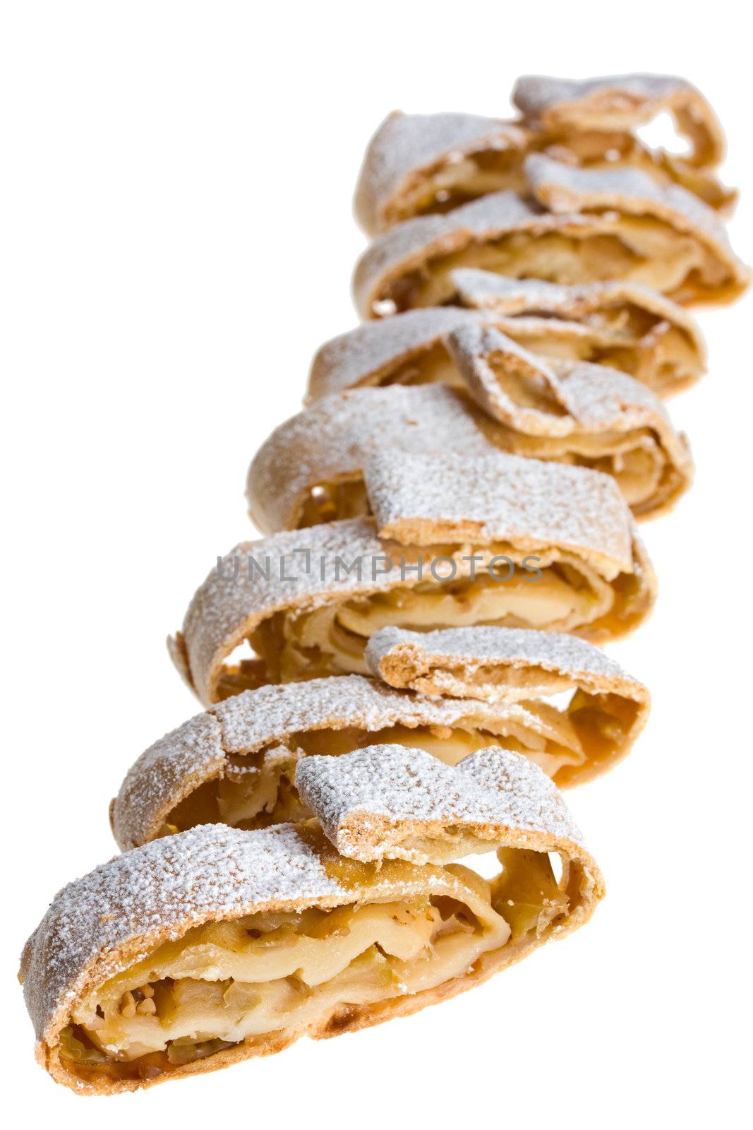 detail of an apple strudel with icing sugar