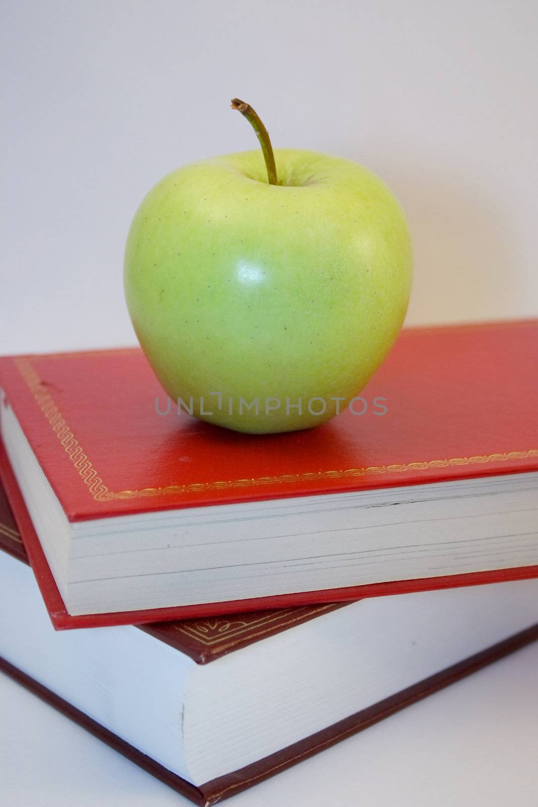 apple on two books closeup