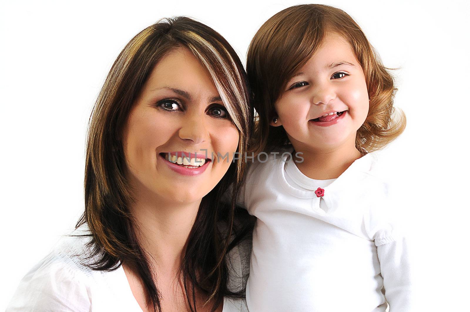 beautiful young mother and daughter hugging and smiling