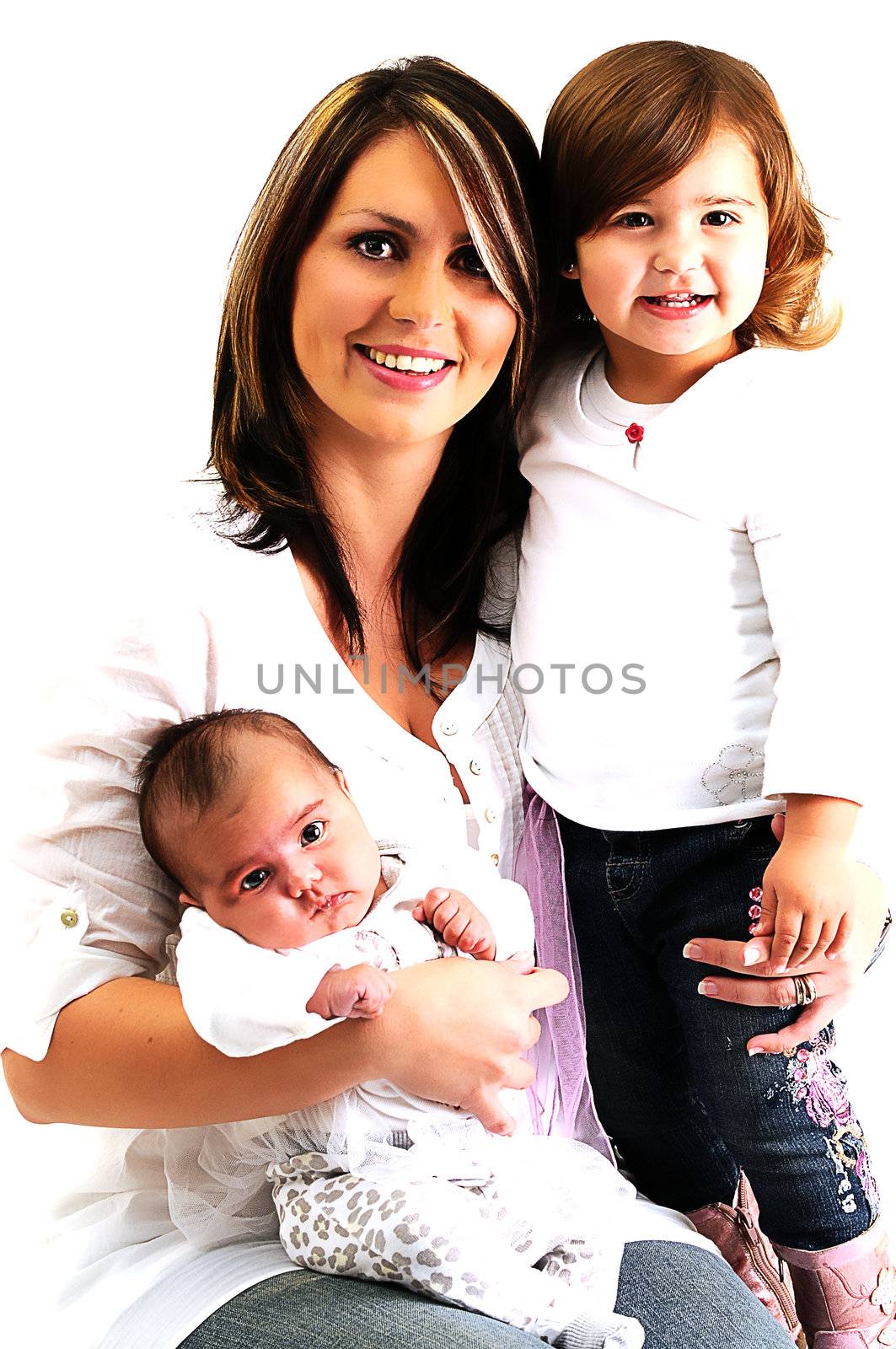 mother with baby and daughter hugging and smiling