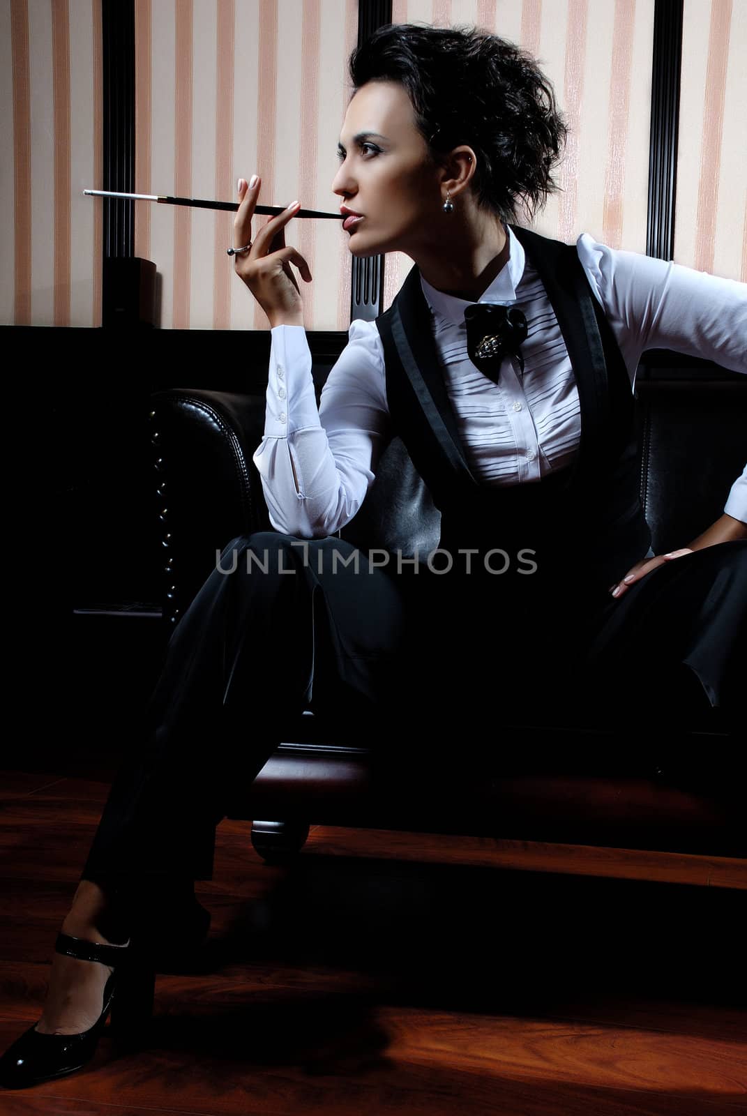 Businesswoman smoking by stevart