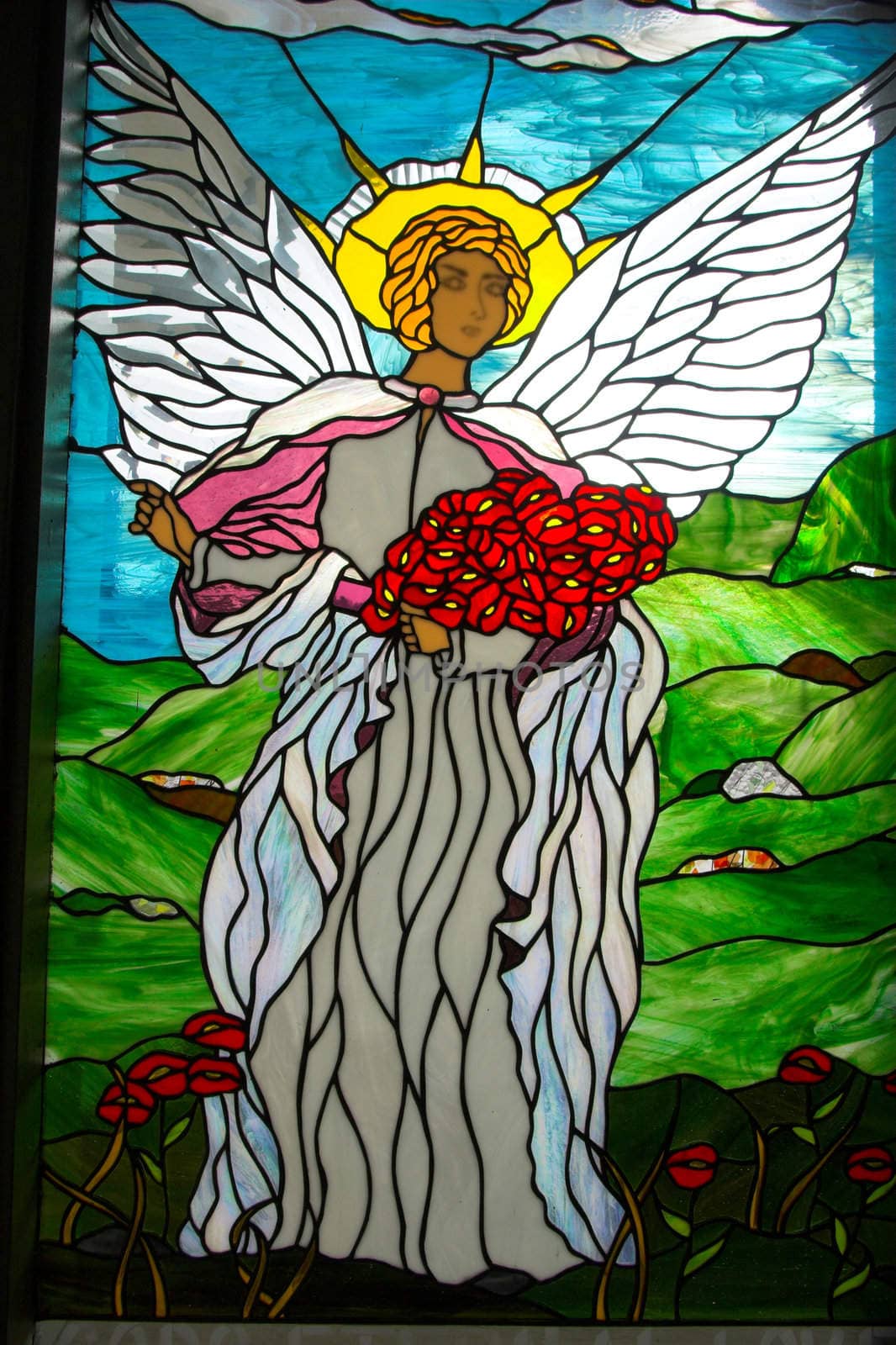 Mosaic angel on stained glass window in Hawaii church