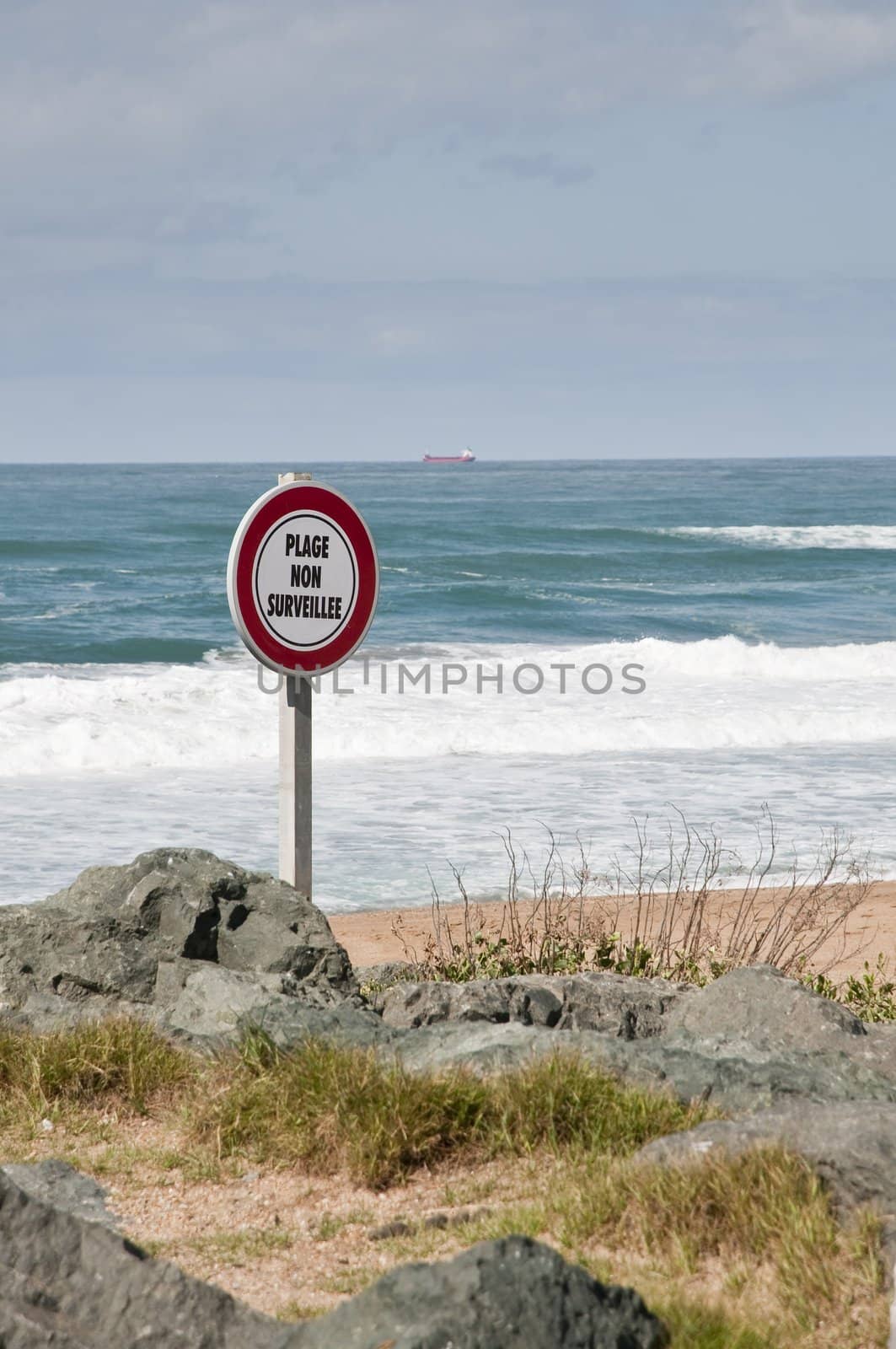 French sign on a beach