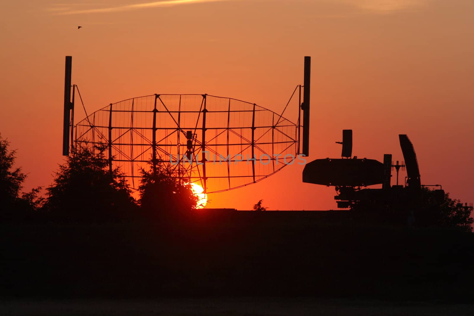 Aerials of a radar in beams the sunset