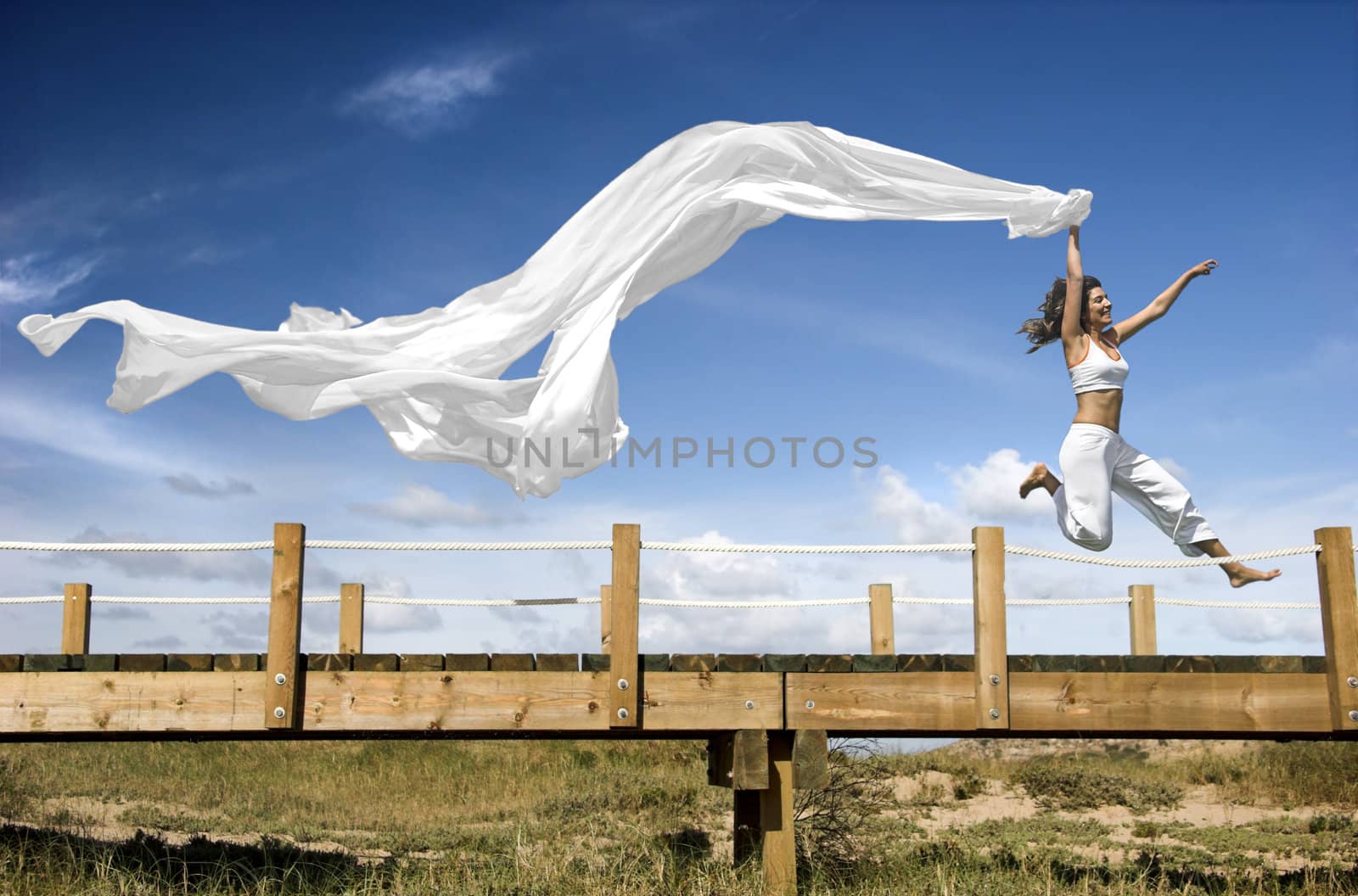 Jumping with a scarf by Iko