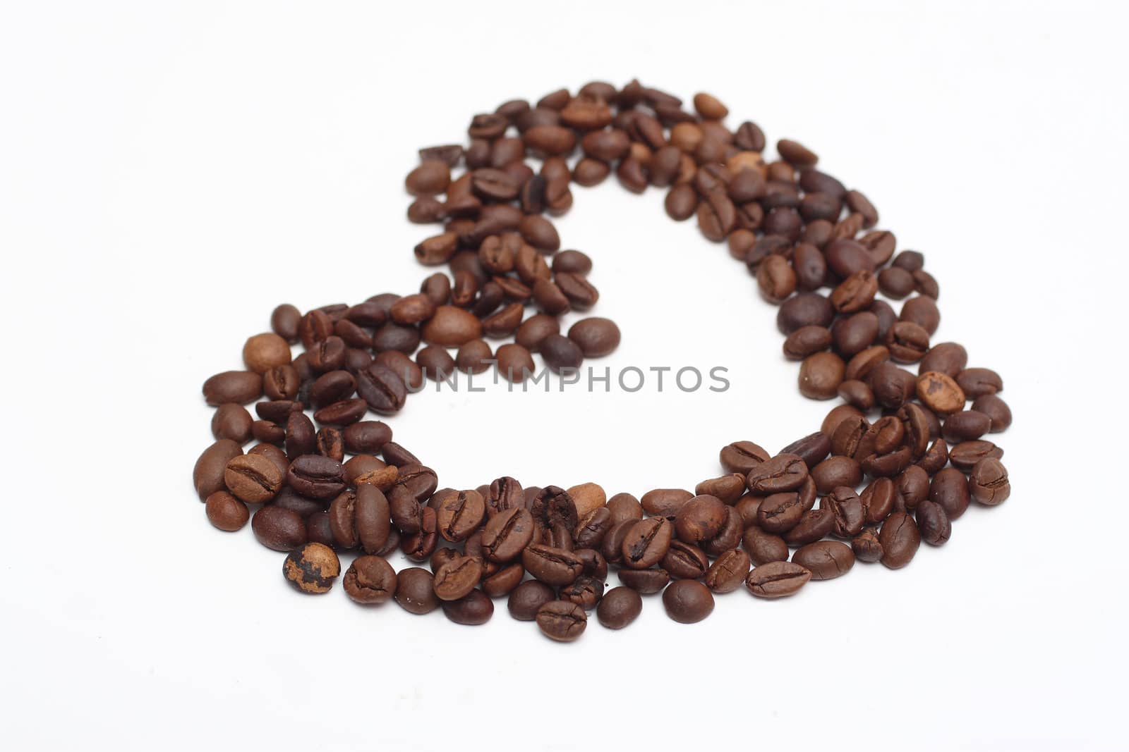 Coffee beans in the shape of a heart