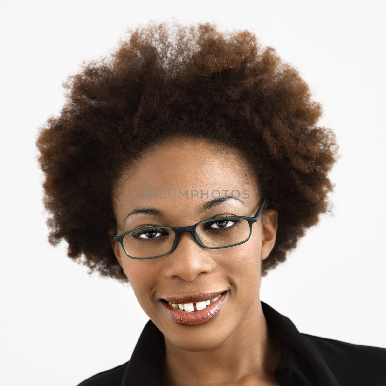 Woman wearing eyeglasses by iofoto