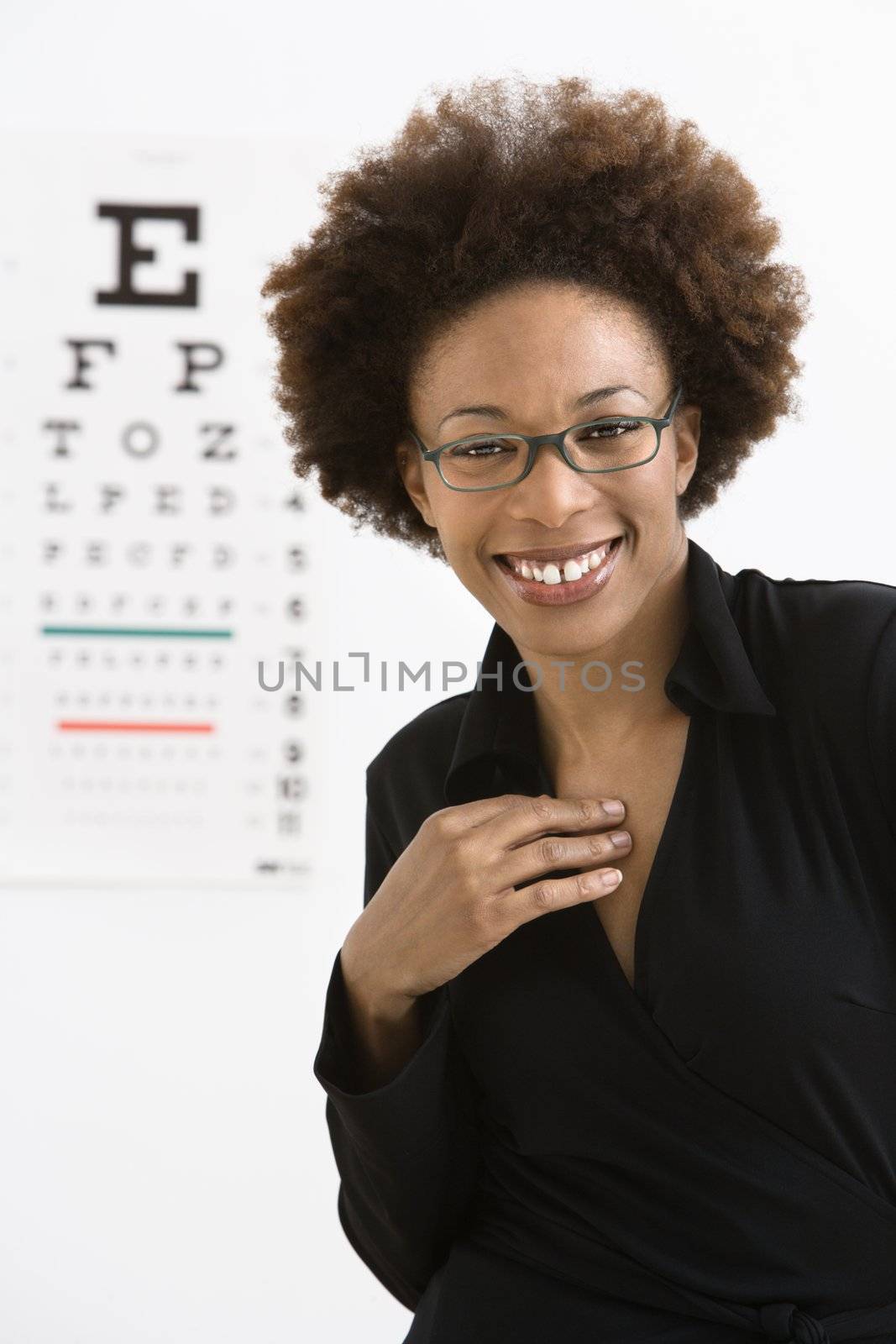 Woman with eye chart by iofoto