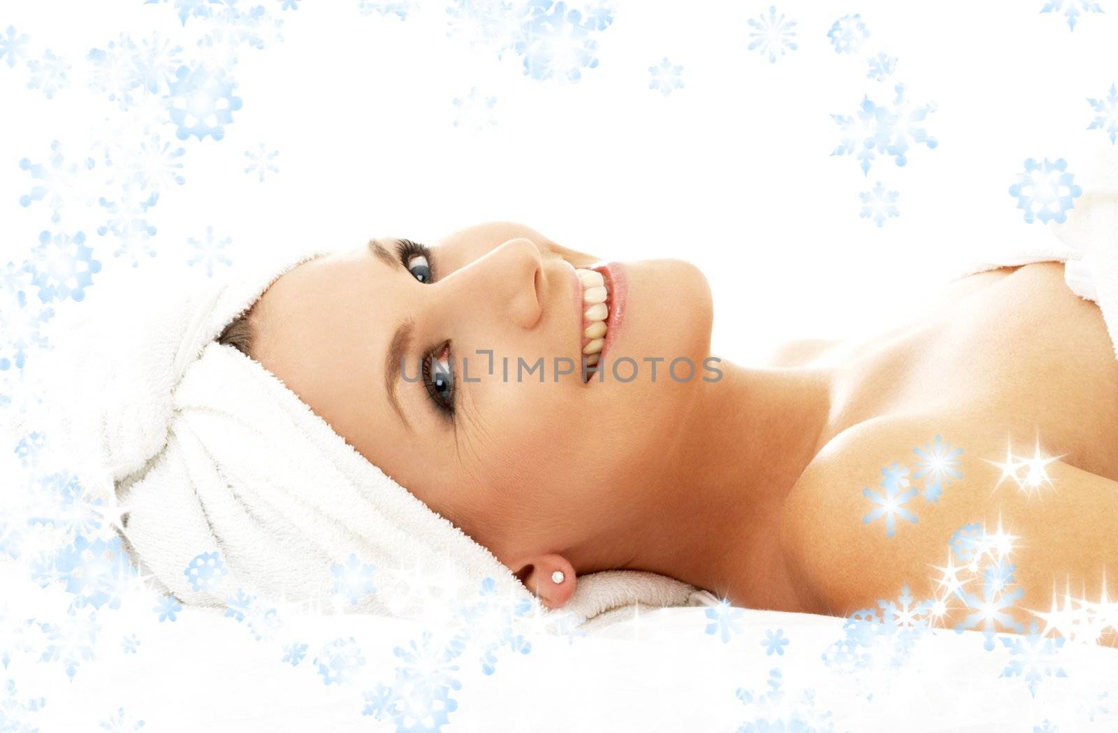 picture of happy lady in massage salon with snowflakes