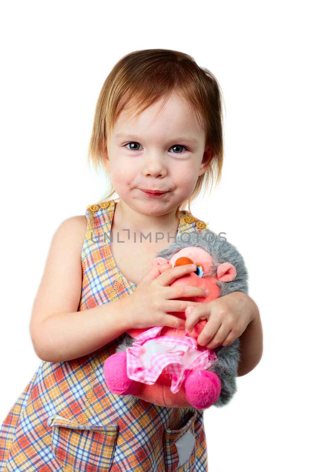 little beauty girl keep silence purse her's lips with toy hedgehog to hand which keep silence too