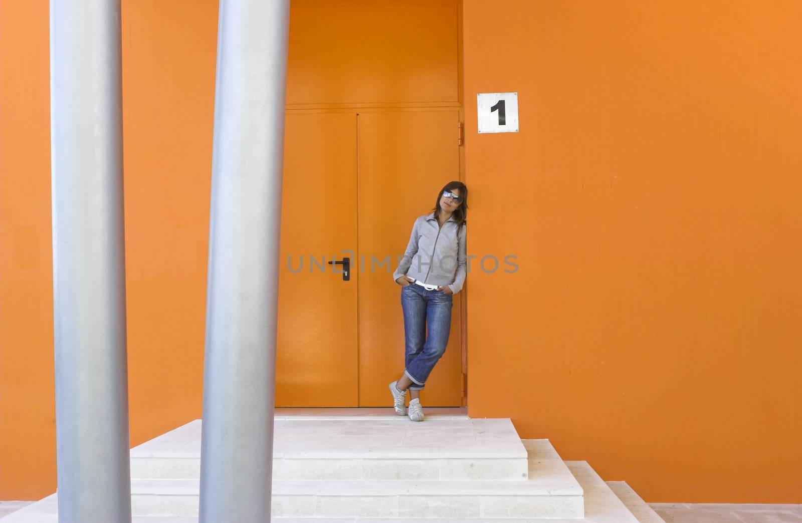 Portrait of a beautiful woman in a orange scene