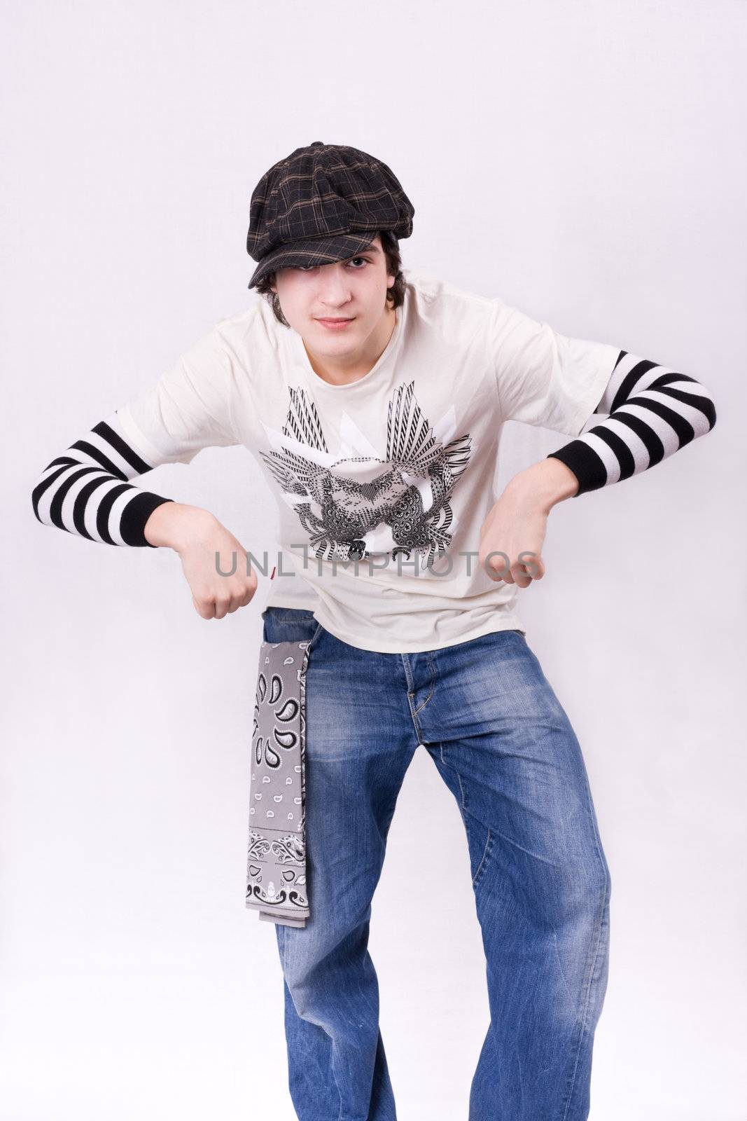 Teenage boy dancing Locking or Hip-hop dance over isolated background