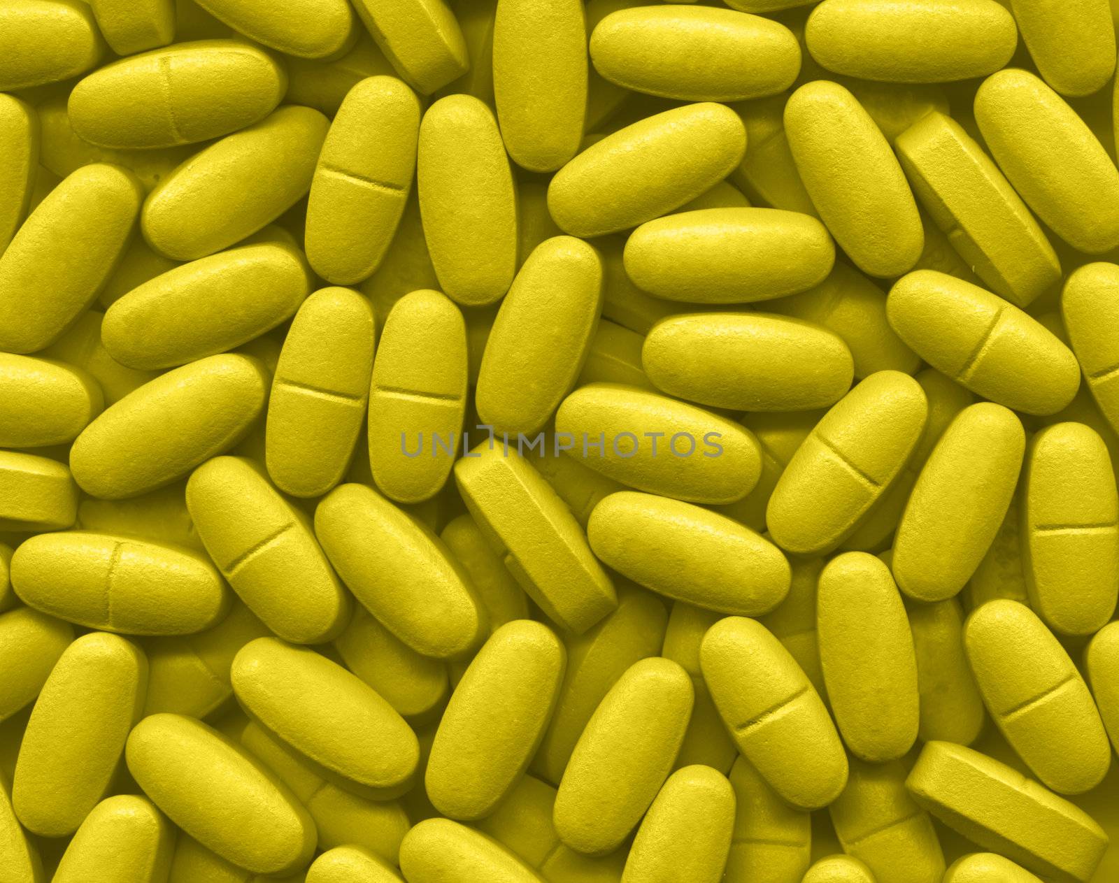 Background made of many yellow pills