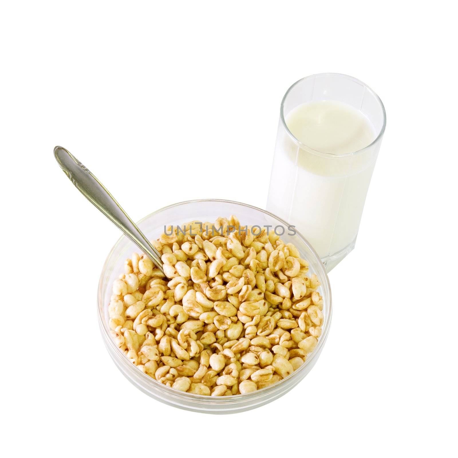 A glass of milk and a bowl of cereals